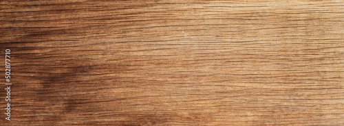 The texture of the wooden surface of a board with natural patterns.Natural wooden background of panoramic view