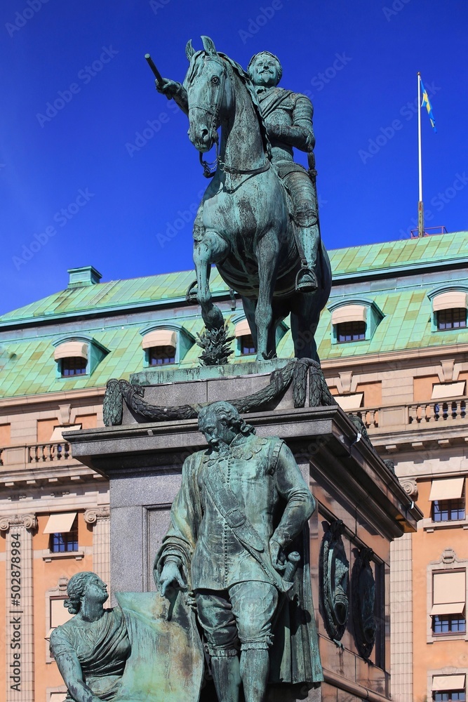 Fototapeta premium Historic statue of Gustav II Adolf in Stockholm from 1796, the pedestal statues were added in 1906