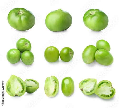 Set of fresh green tomatoes on white background