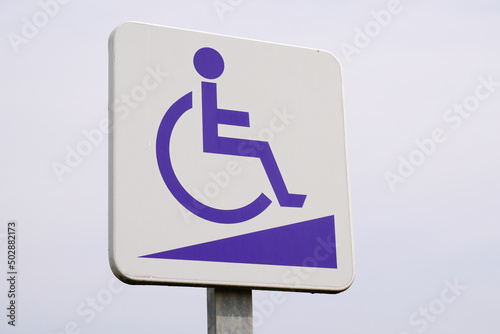 disabled accessible entry sign post with wheelchair handicap logo pmr means  people someone with reduced mobility access pictogram