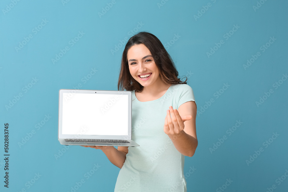 Young woman with laptop showing Young woman with laptop showing