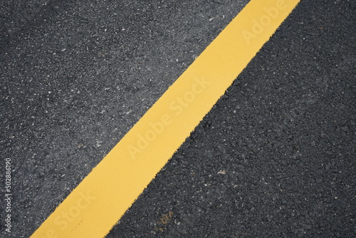 yellow road marking color Used in the background of advertising media, transportation systems. © suwichan