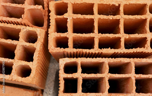 close-up stack of bricks detail background © aykutkarahan