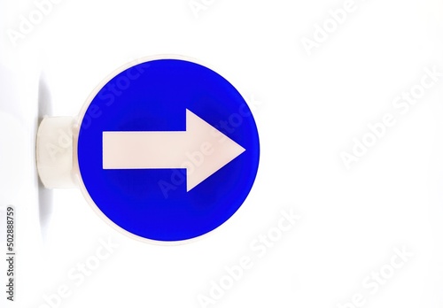 Traffic sign with a white arrow on a blue background indicating a mandatory direction to the right Free Download Traffic sign with a white arrow on a blue background indicating a mandatory direction to the right - GFXLoad