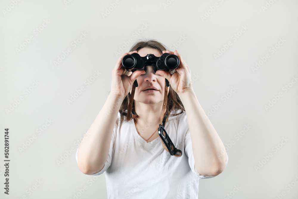 Woman with binocular. Businesswoman looking through binoculars. Woman with binocular. Businesswoman looking through binoculars.
