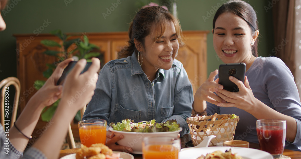Small girl group party asia people busy talk smile eat brunch food drink.  Young woman fun