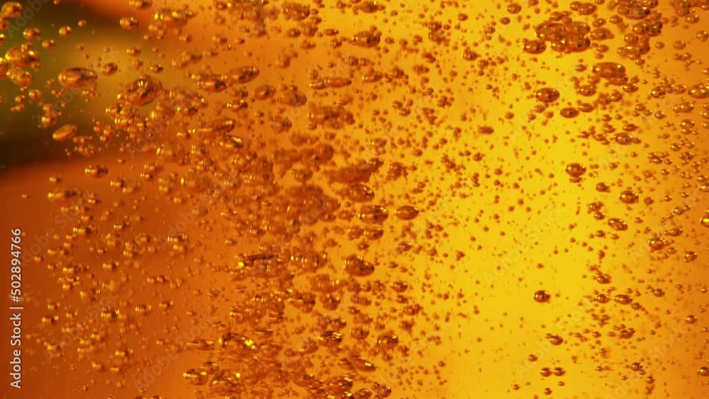 Super Slow Motion Shot of Beer Bubbles Background at 1000fps. Super Slow Motion Shot of Beer Bubbles Background at 1000fps.