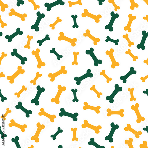 Seamless pattern with yellow and green bones.