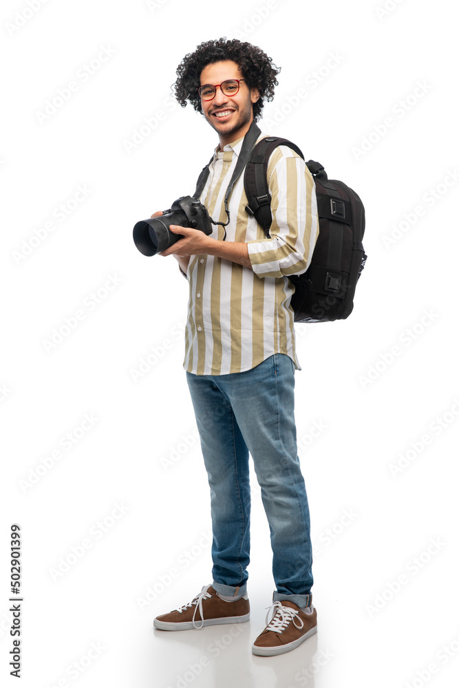 photography, profession and people and concept - happy smiling man or photographer in glasses with digital camera and backpack over white background
