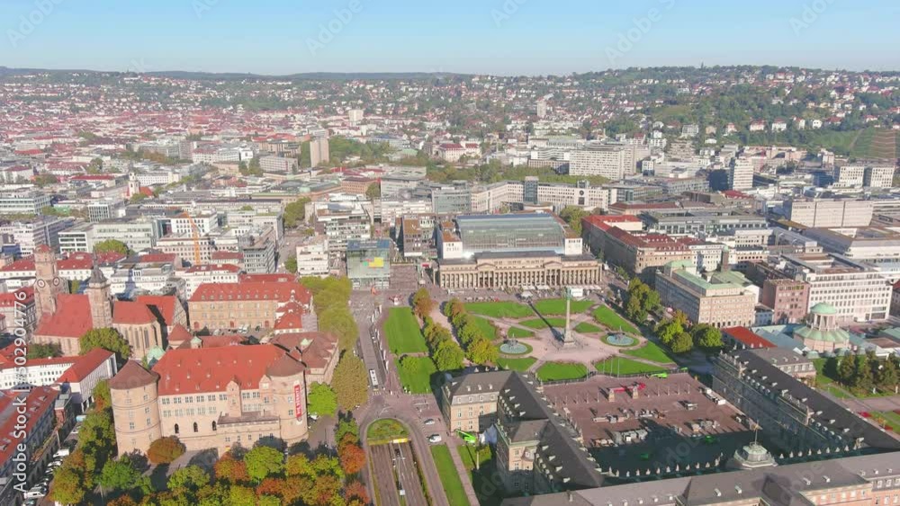 Stuttgart: Aerial view of city in Germany, famous square Schlossplatz with central column flanked by historic buildings and gardens, sunny day - landscape panorama of Europe from above
Stuttgart: Aerial view of city in Germany, famous square Schlossplatz with central column flanked by historic buildings and gardens, sunny day - landscape panorama of Europe from above