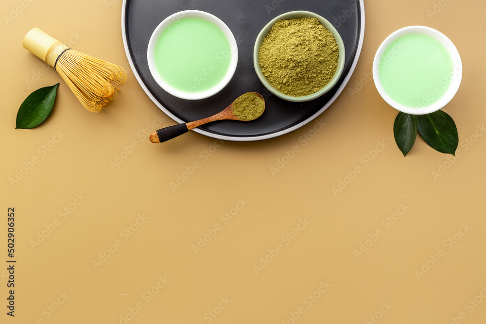 Matcha tea powder with green hot drink - asian tea ceremony