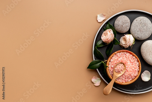 Beauty treatment massage with spa stonea and pink sea salt, top view photo