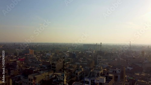 Wallpaper Mural  Drone shot of traditional city of Pakistan with minaret Torontodigital.ca