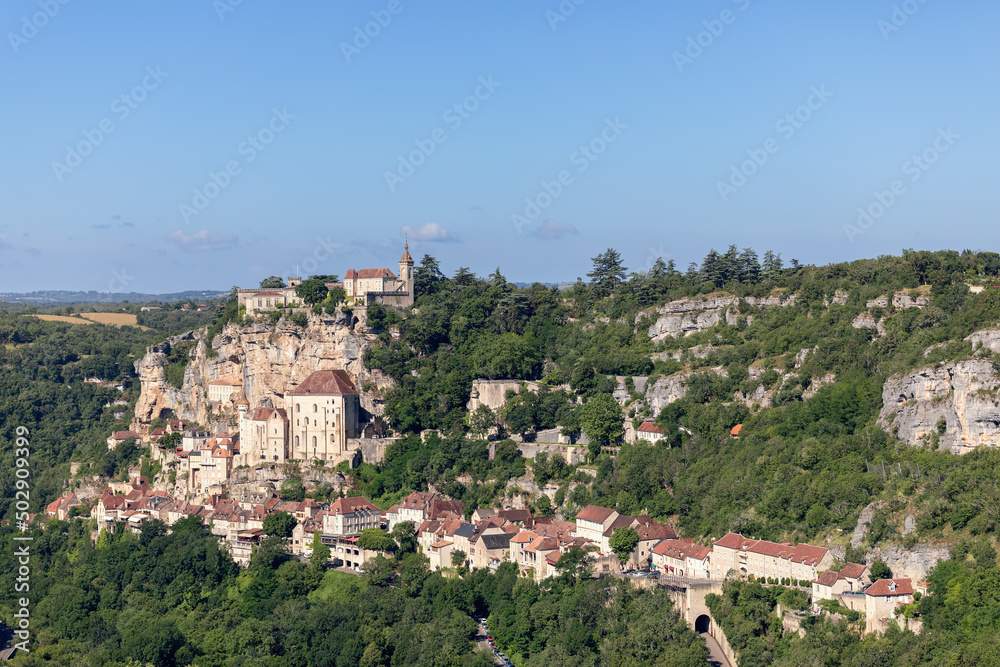 Super panoramic view of right steep rocky bank of river Alzou and ancient settlements of Rocamadour. Lot, Occitania, Southwestern France