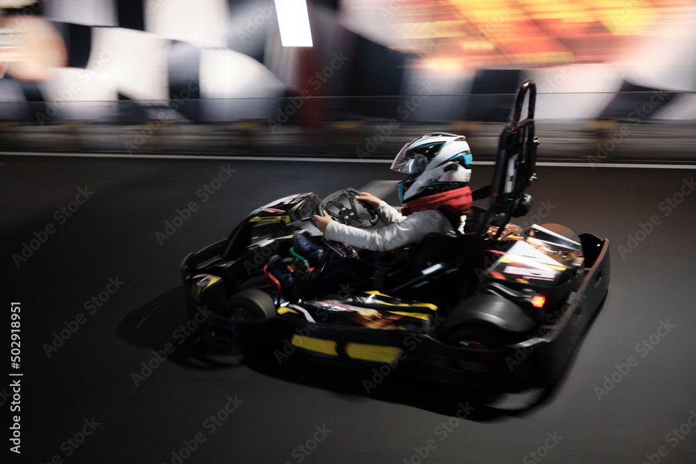 Electric Go kart driver speed rive indoor circuit race - obrazy, fototapety, plakaty 