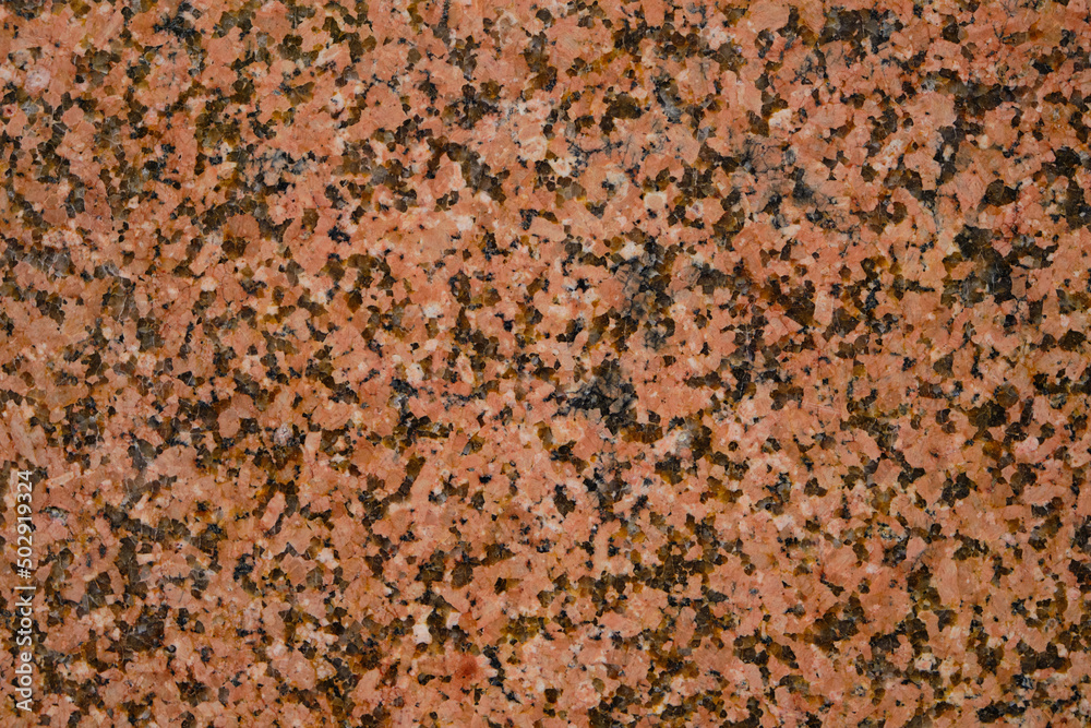 Background and texture granite stone with black inclusions. Background and texture granite stone with black inclusions.