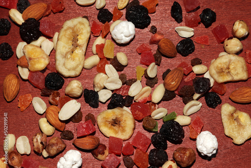 dried fruits and nuts on a wooden table