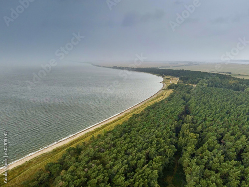 Bird view to the Palmer Ort which is close to the Greifswalder Bodden and waiting for the rain shower to come photo