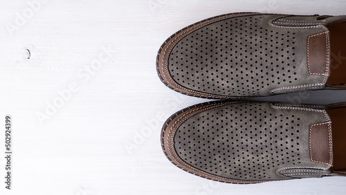 Men's leather shoes on a white background. Style and fashion.