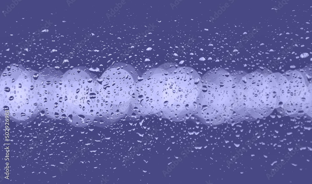 raindrops on glass. Water drops background. Blurred background. Pantone 2022 very peri. raindrops on glass. Water drops background. Blurred background. Pantone 2022 very peri.