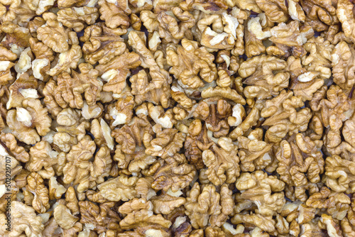 Many walnut kernels as background, texture, pattern.