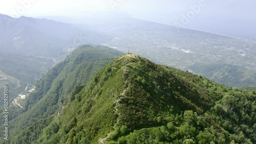 Sea coast and Apuane Mountains with Carrara white marble caves in Versilia