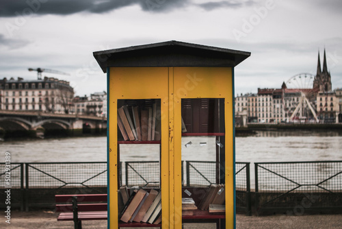Yellow Bohamian bookstore with sea view stormy wheater mood. © Domonkos
