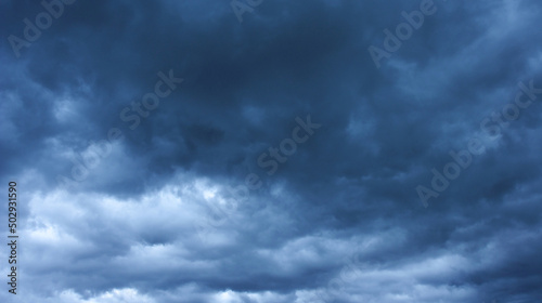 Dark storm clouds blue color photo backgrounds