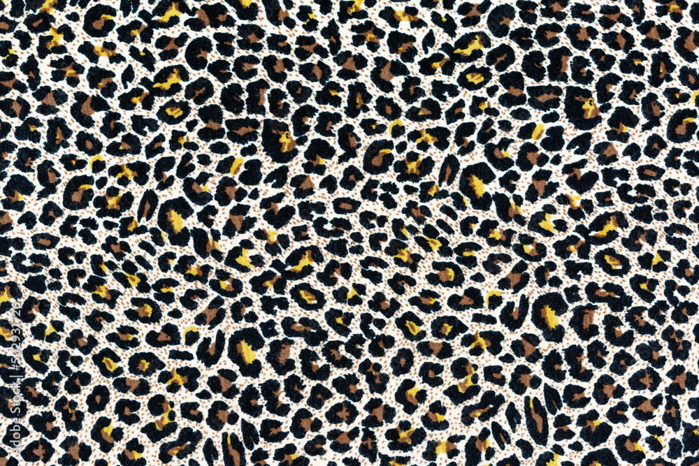 Leopard skin surfaces as a background, texture, pattern.