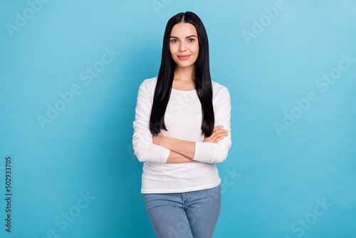 Photo of hr millennial brunette lady crossed palms wear white shirt isolated on blue color background