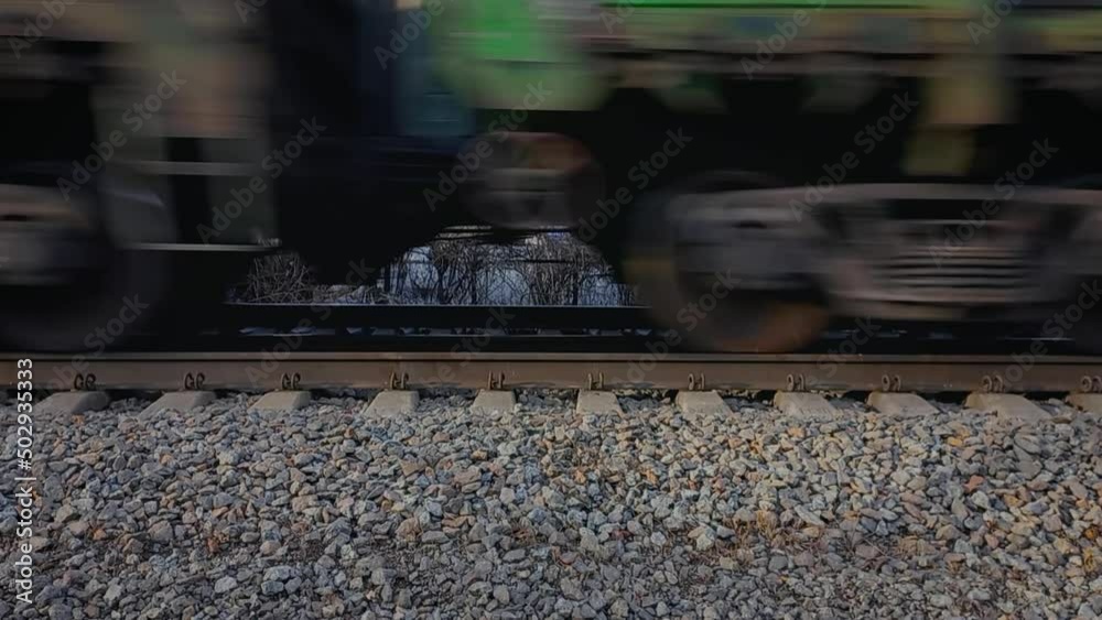 two trains running opposite by the railway