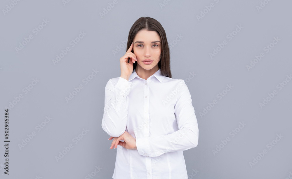 thinking businesslady in white shirt on grey background, ceo thinking businesslady in white shirt on grey background, ceo