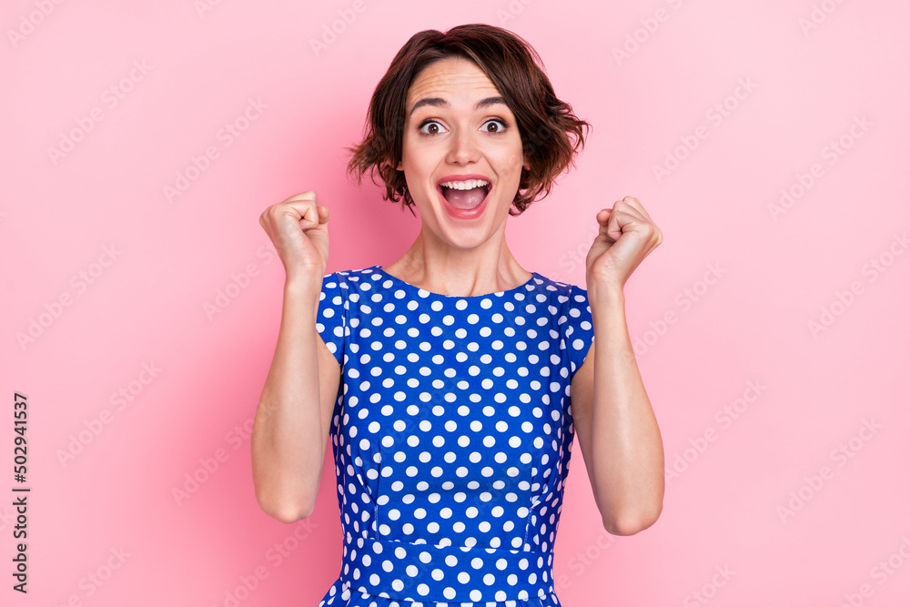 Photo of celebrate young brunette lady yell wear blue top isolated on pink color background Photo of celebrate young brunette lady yell wear blue top isolated on pink color background