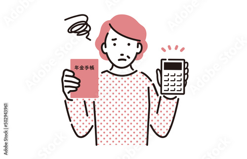 年金手帳と電卓を持つ困った顔のシニア女性