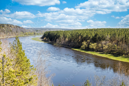 The beautiful natural landscape of river and green forest