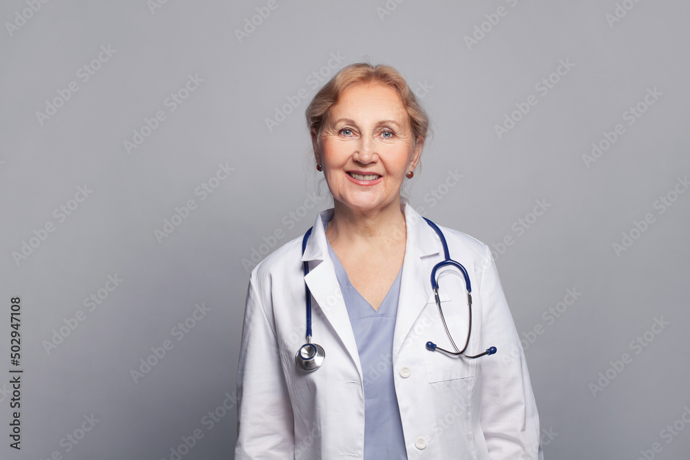 Female doctor in professional medical uniform. Physicianat work in hospital or clinic. Healthcare, insurance and medicine concept