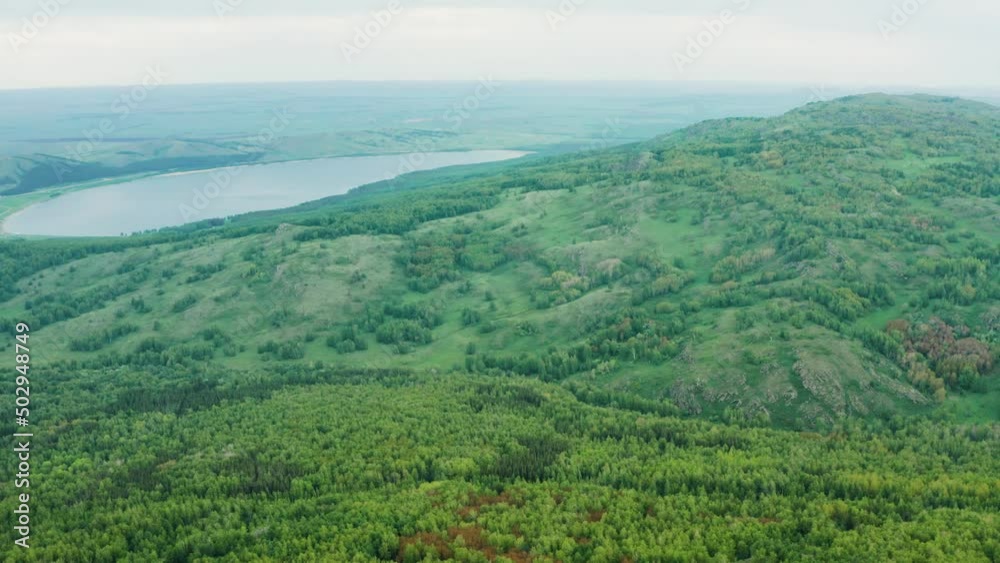 Ural Mountains, Irendyk ridge and Talkas lake. Aerial view. Ural Mountains, Irendyk ridge and Talkas lake. Aerial view.