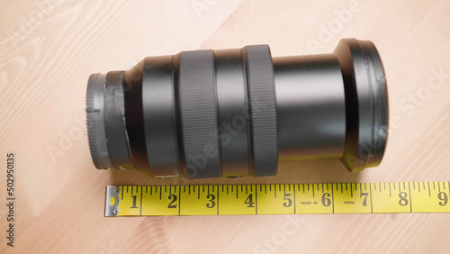 Tableau sur toile Measuring tape measure size of camera lens zoom