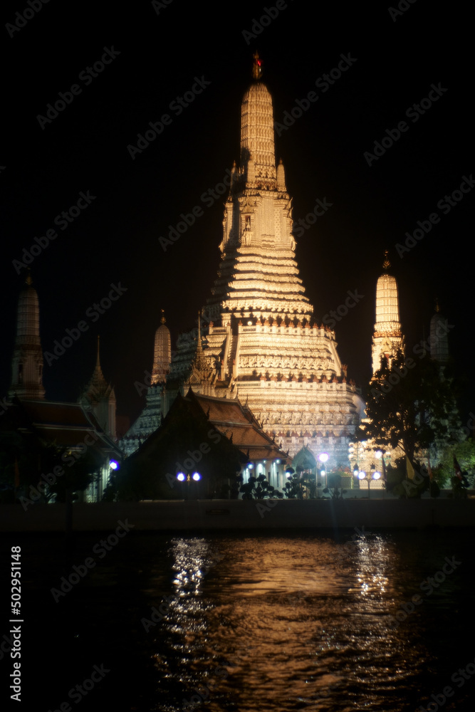 Ancient temple Wat Arun Temple under night sky at Chaophraya riverside ,Bangkok ,Thailand .This temple is public place and famous landmark tourist attraction in Thailand Ancient temple Wat Arun Temple under night sky at Chaophraya riverside ,Bangkok ,Thailand .This temple is public place and famous landmark tourist attraction in Thailand