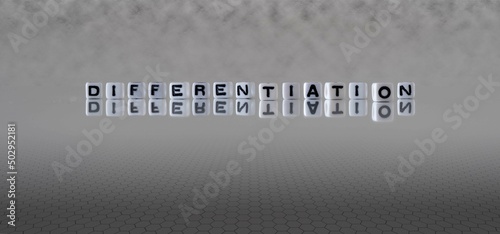 Canvas Print differentiation word or concept represented by black and white letter cubes on a