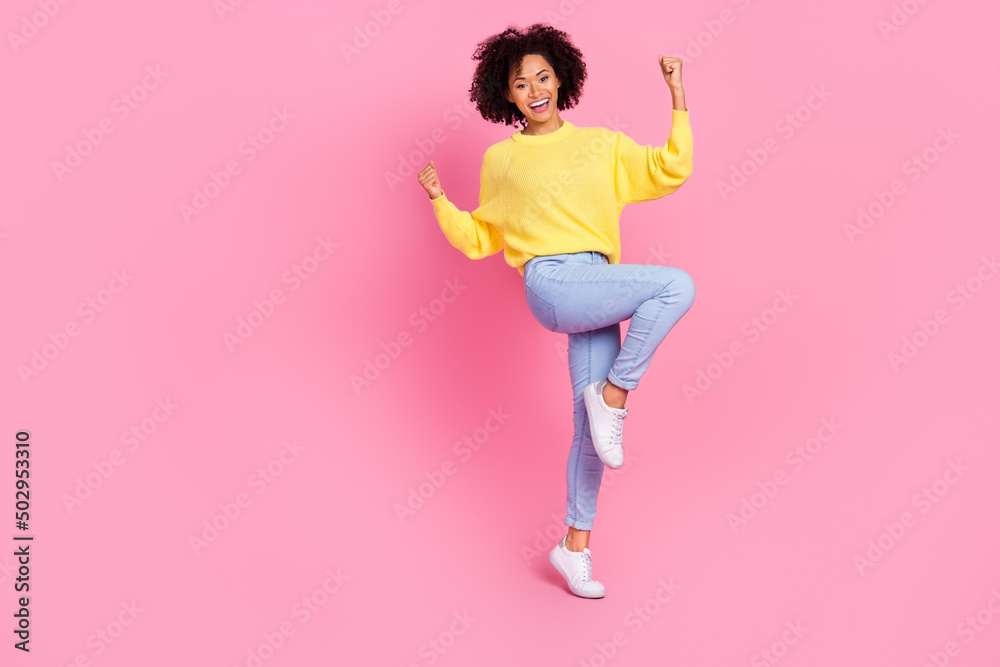 Full body photo of young lady rejoice luck triumph discount fists hands isolated over pink color background