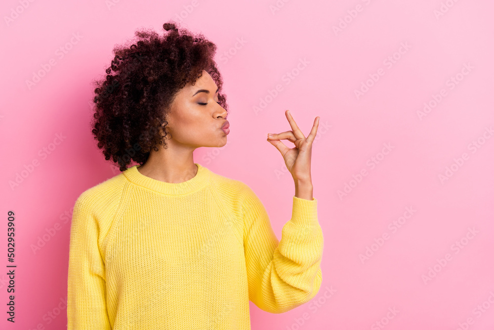 Photo of young pretty girl dream pouted lips hungry show fingers yummy symbol isolated over pink color background