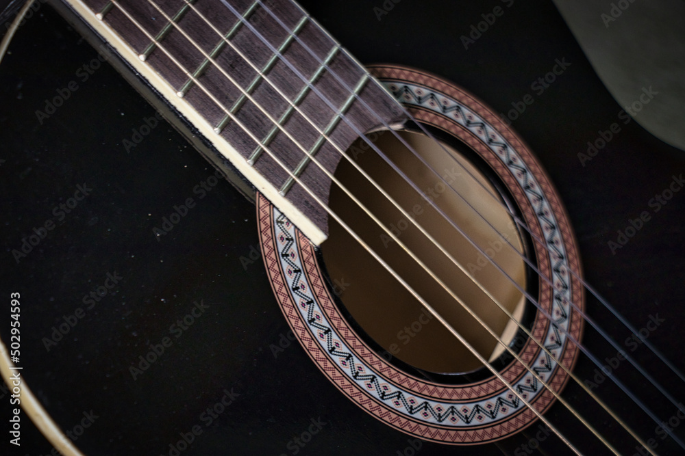 Obraz premium Black guitar details strings