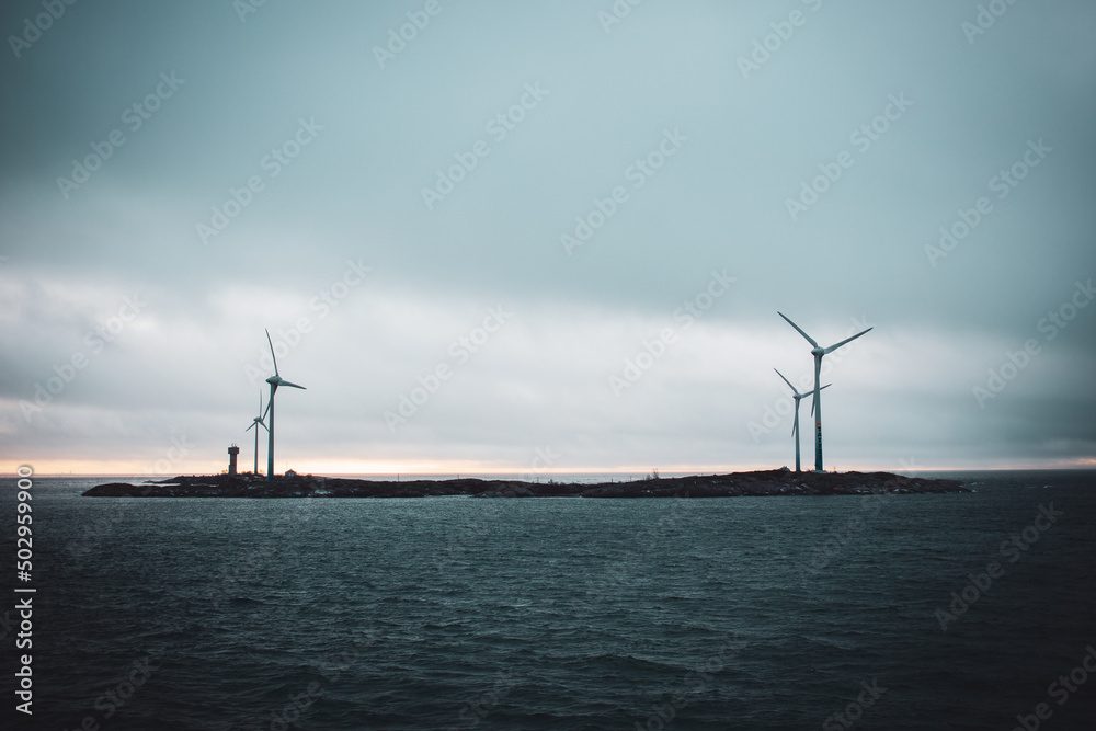 ocean sea  winter island  windmills without person
