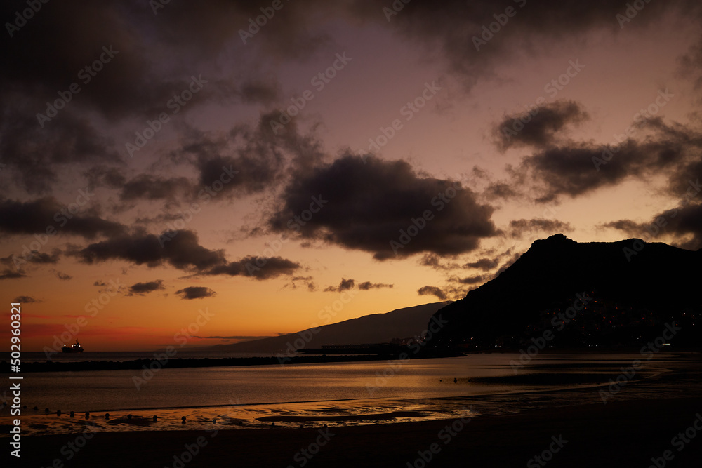 cliff and mountain with blue sky sunset sunrise ocean sea beach