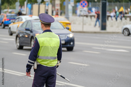 Traffic officer standing near road