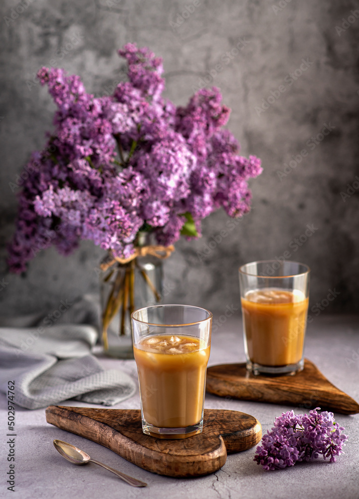 Food photography of cold coffee, tea, drink, lilacs Food photography of cold coffee, tea, drink, lilacs