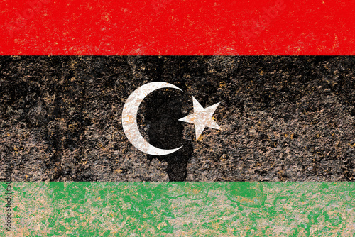 National flag of libya painted on a distressed old rusty iron sheet