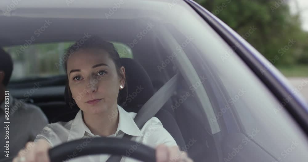Young woman driver in Uber