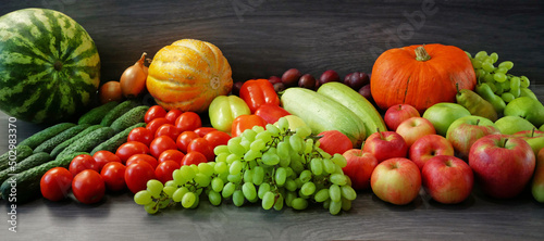 many different fruit and vegetables  green glocery shop  healthy fresh colored fruits and vegetables background delivery